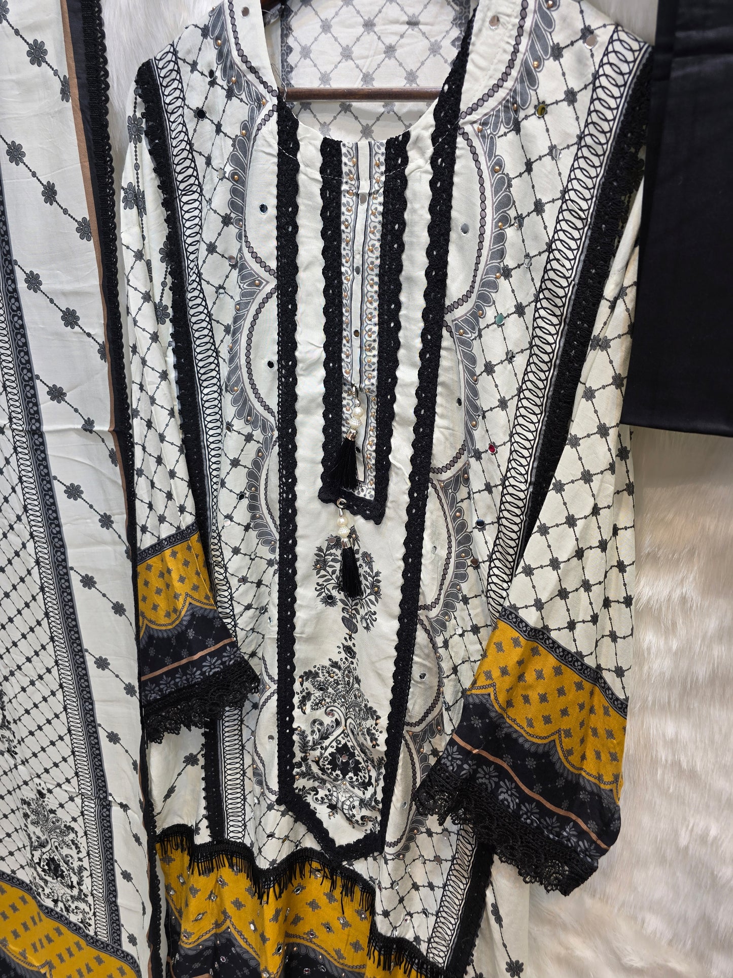PURE MUZLIN 3 PC SET SEMI STITCHED WHITE AND BLACK WITH BEAUTIFUL LACE WORK AND MIRROR WORK