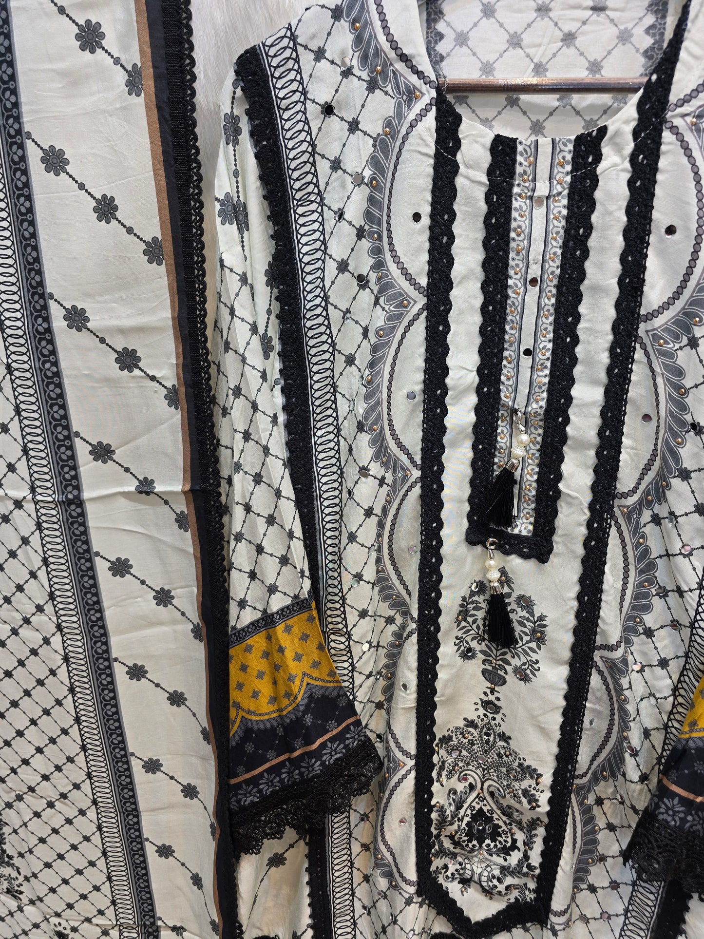 PURE MUZLIN 3 PC SET SEMI STITCHED WHITE AND BLACK WITH BEAUTIFUL LACE WORK AND MIRROR WORK