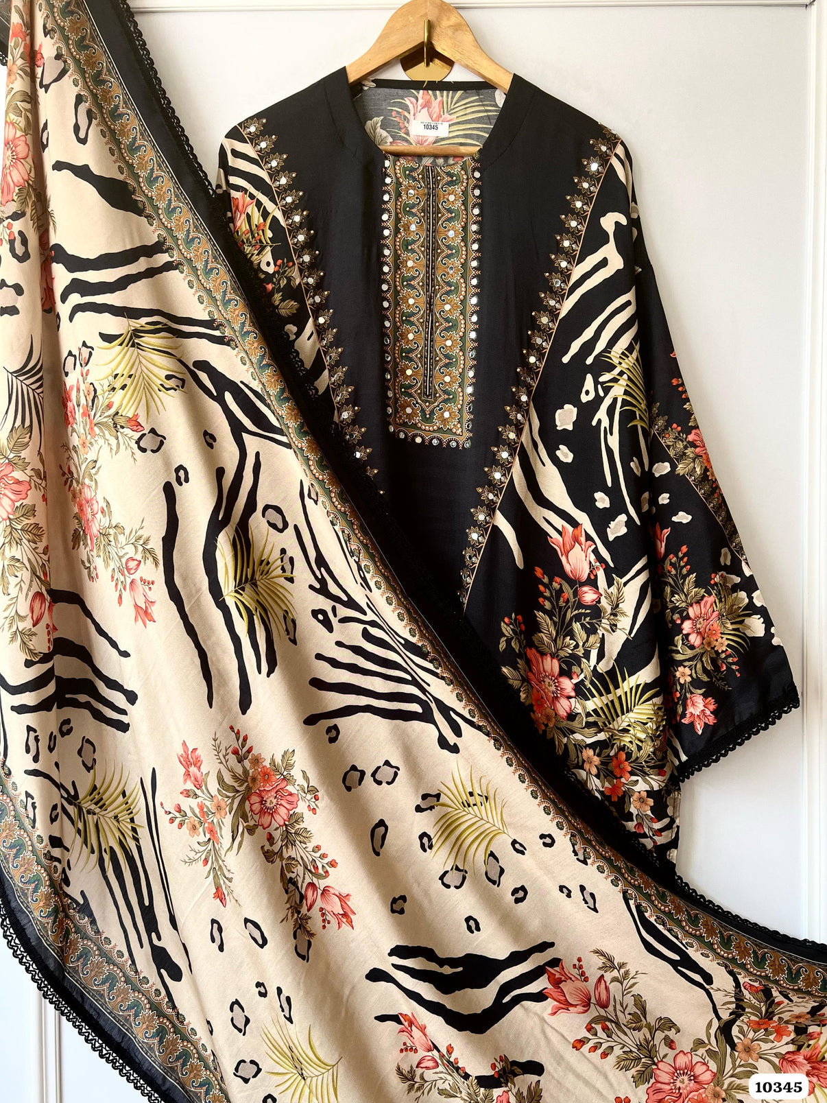 Pure muslin semi stitched shirt with beautiful Pakistani print with laces & mirror work